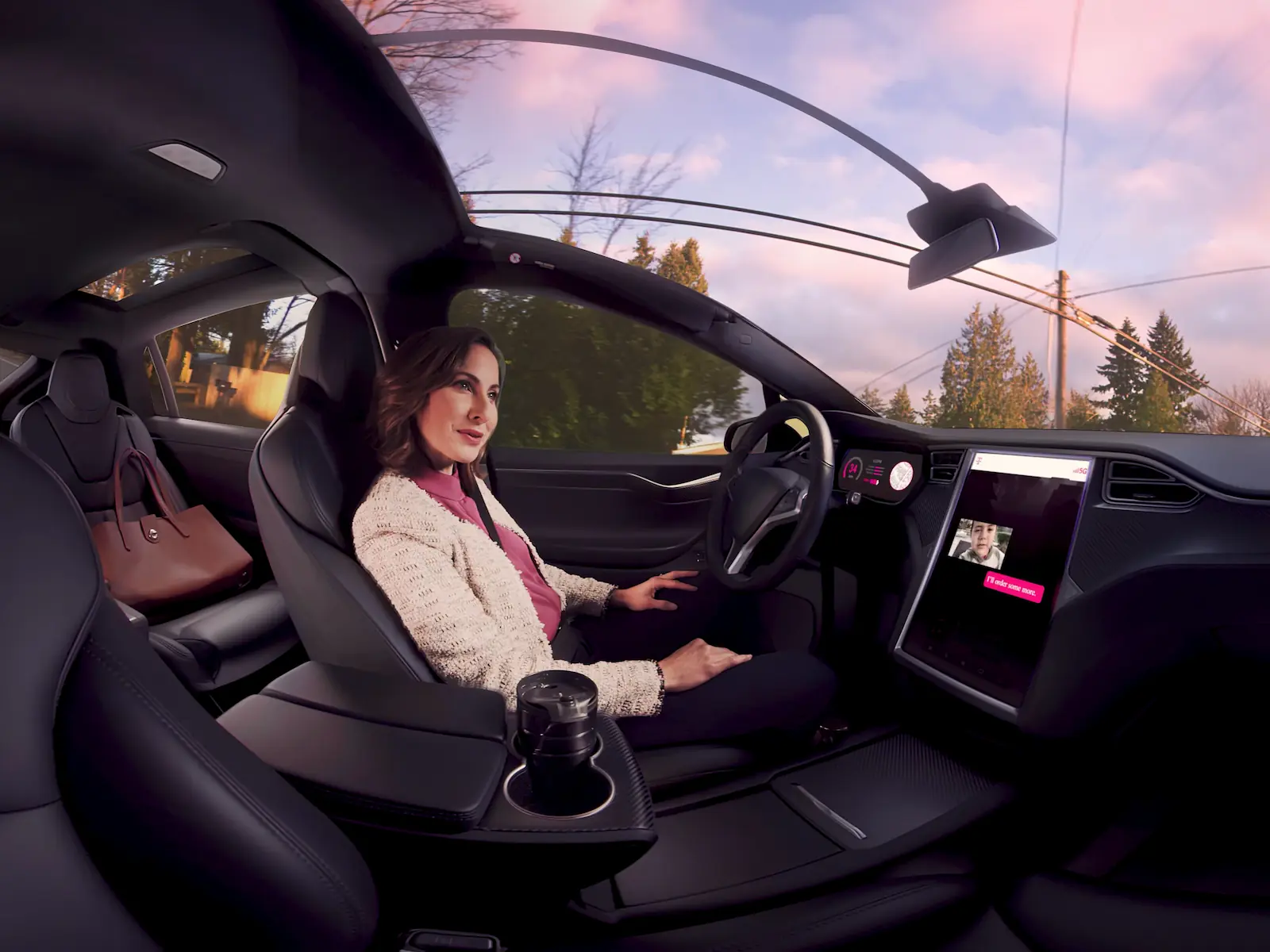 tmobile-5g-woman-in-car-connected-with-family